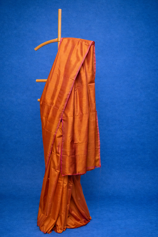 Burnt Orange single colored pure silk saree with coppery highlights