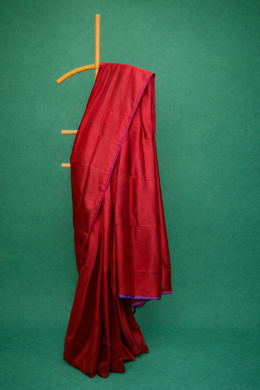 Rich deep red single colored pure silk saree with a luxurious sheen