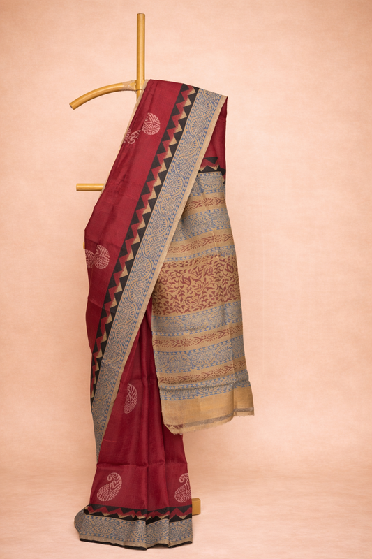 Deep maroon colored dupion silk saree with Heritage Border