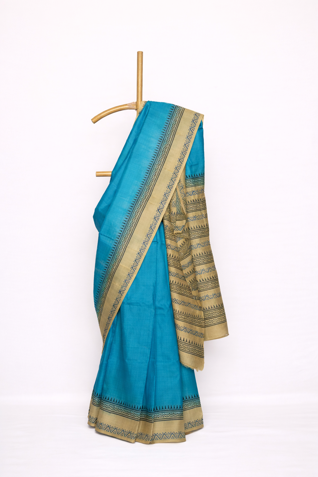 Teal Blue colored dupion silk saree with Classic Beige Border