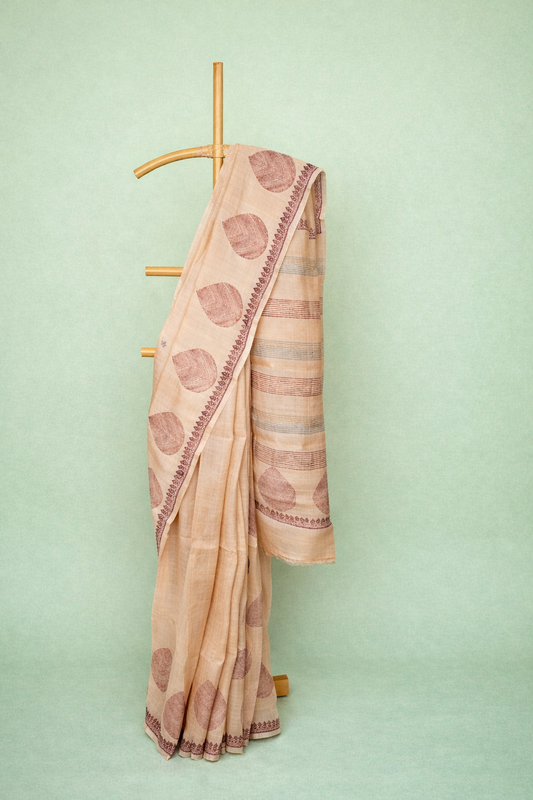 Soft Beige colored dupion silk saree with Circular Motifs