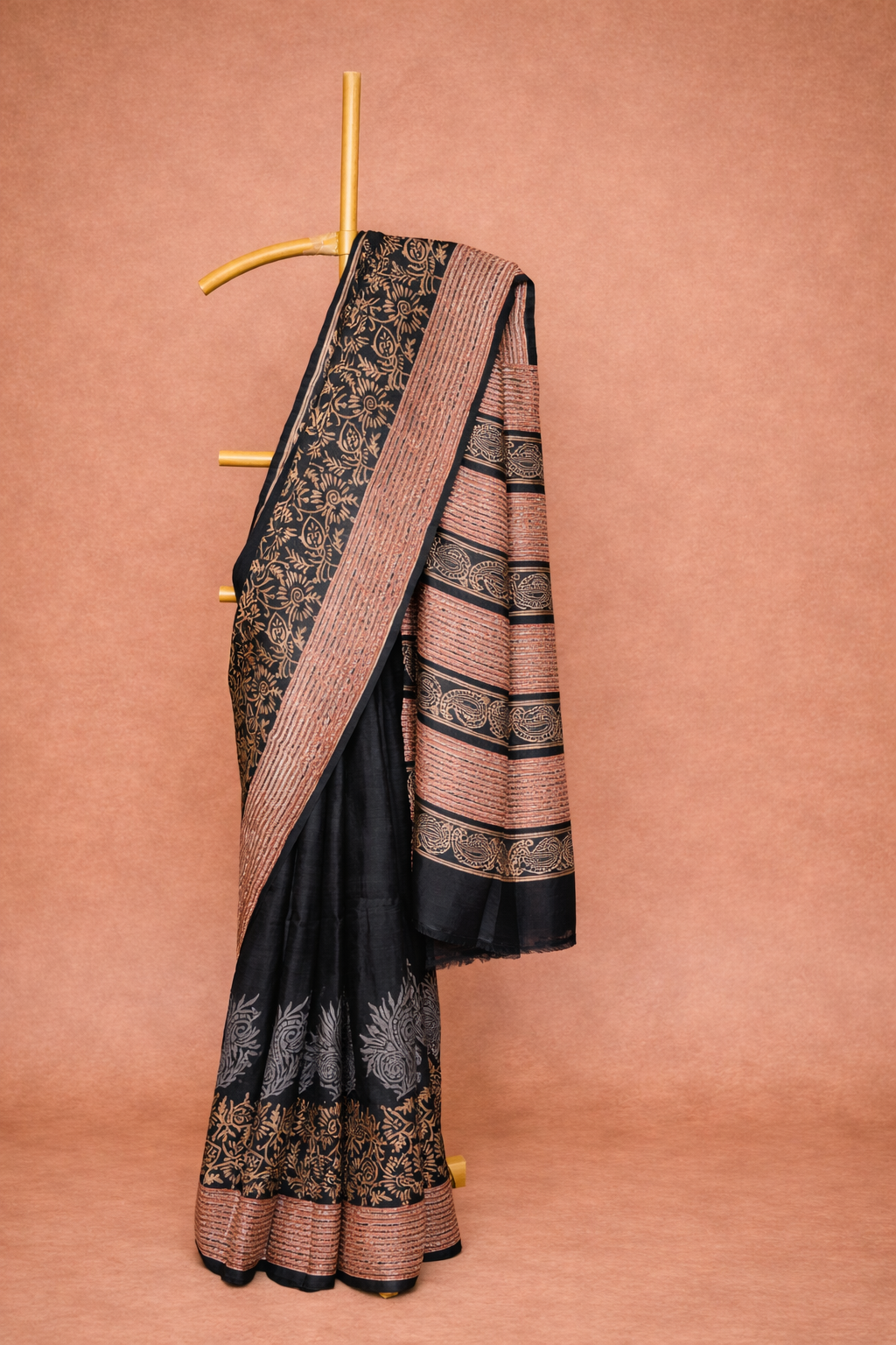 Deep Black colored dupion silk saree with Antique Gold Floral Detailing