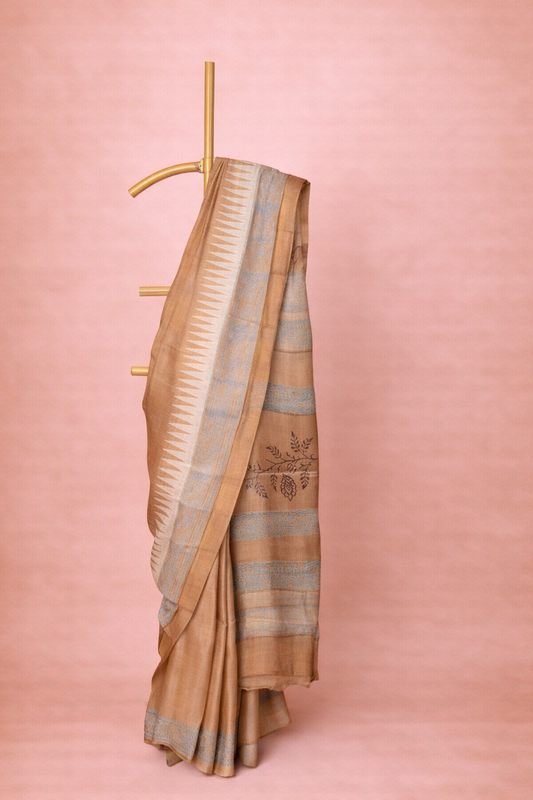 Earthy Brown colored block printed hand spun tussar saree with Blue Accents