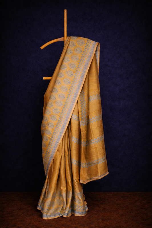 Dark golden colored hand block printed pure tussar silk saree